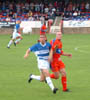 Nicky Forster battles for possession